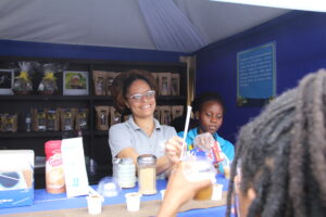 Deaf Can! Baristas serving coffee.